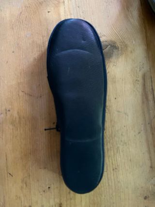 Ciabatte da viaggio nere compatte salvaspazio.