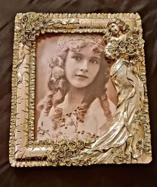 Cornice portafoto ricca e decorata