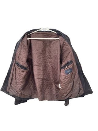 Casaco em pele castanho