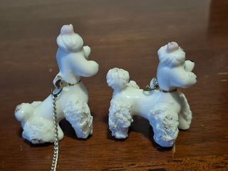 Barboncini vintage in ceramica con catena