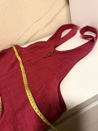 Mono rosa fucsia con botones