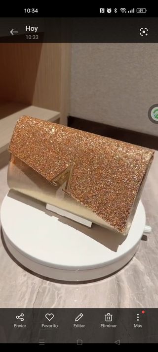 Bolso de fiesta dorado con purpurina