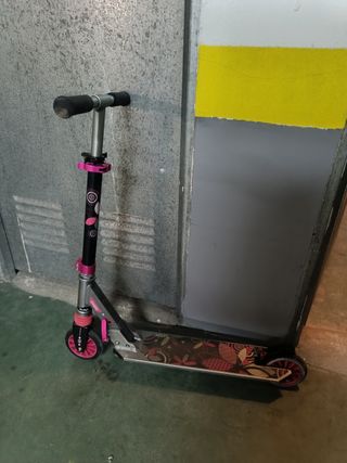 Patinete Oxelo rosa y negro