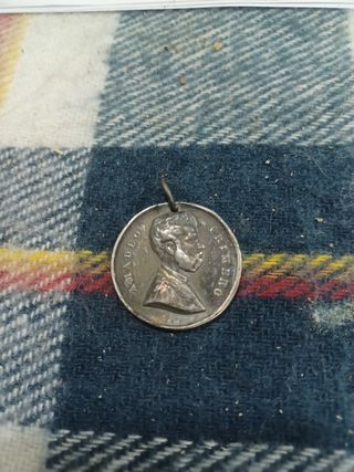 Medalla antigua con retrato