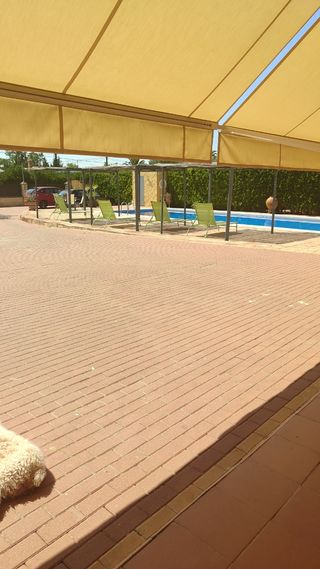 Chalet con piscina,Con parcela de 1,500 m.