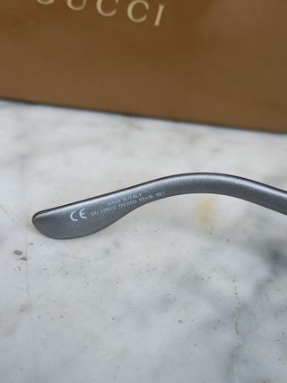 Occhiali da sole Gucci grigi