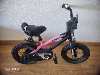 Bicicleta infantil rosa y negra