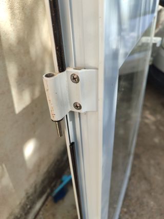 Puerta balconera con persiana