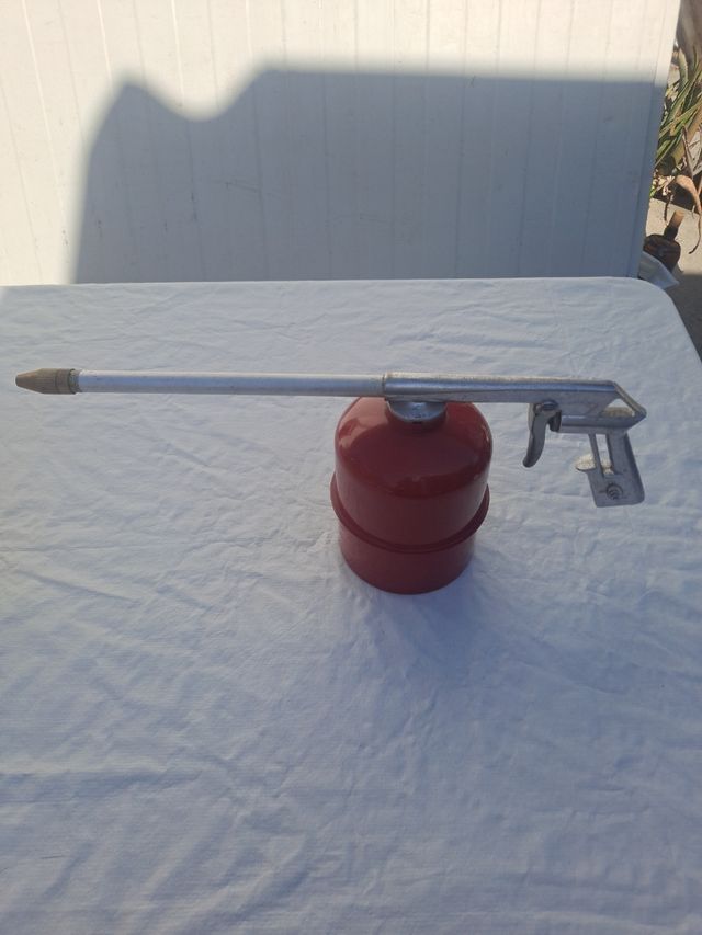 Pistola pulverizadora roja