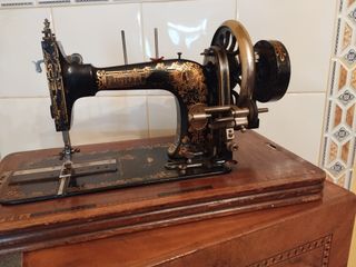 Antigua máquina de coser Frister