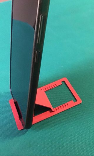 Supporto cellulare rosso tascabile