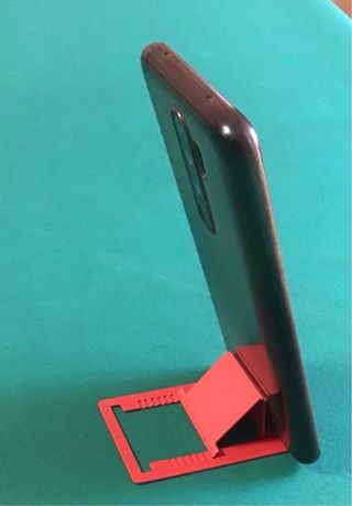 Supporto cellulare rosso tascabile
