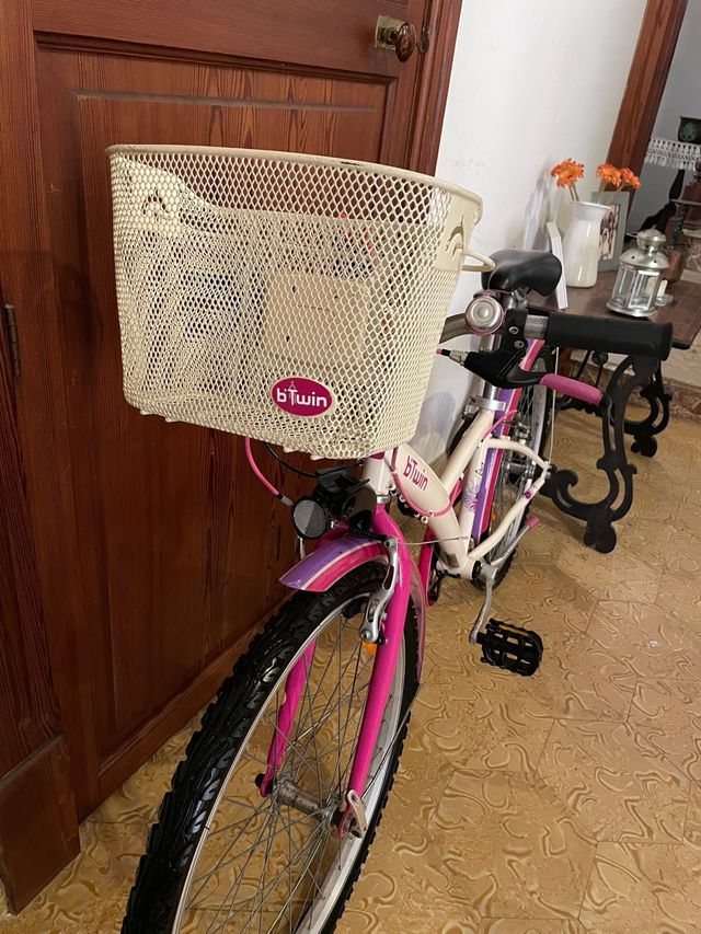 Bicicleta infantil Btwin rosa con cesta
