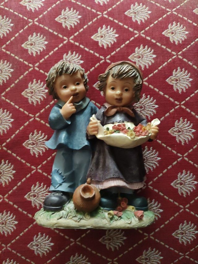 Figura decorativa niños con cesta