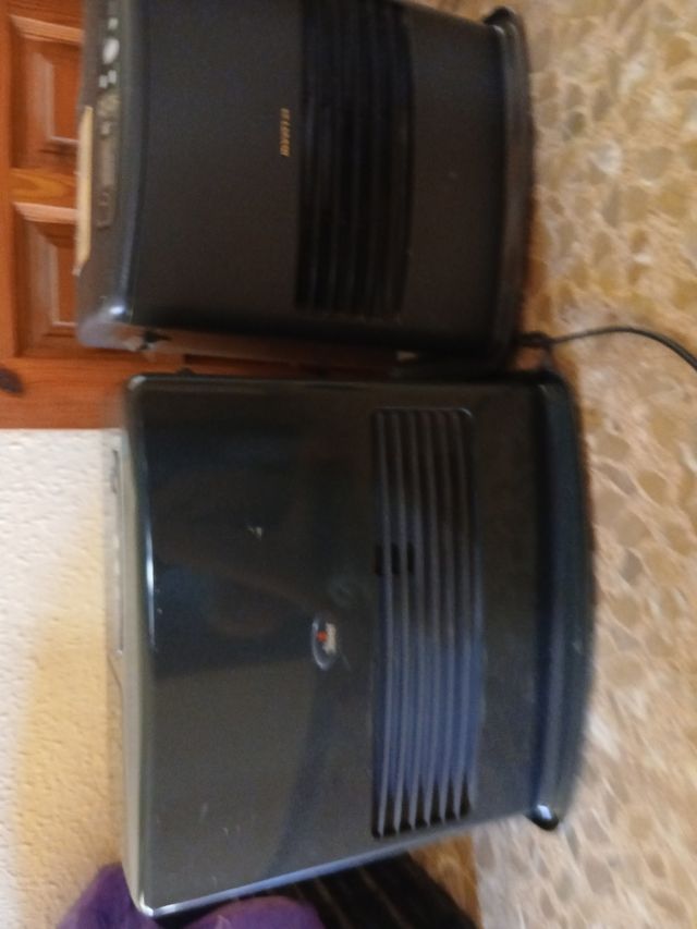 2 estufas de parafina negros. 2 tamaños