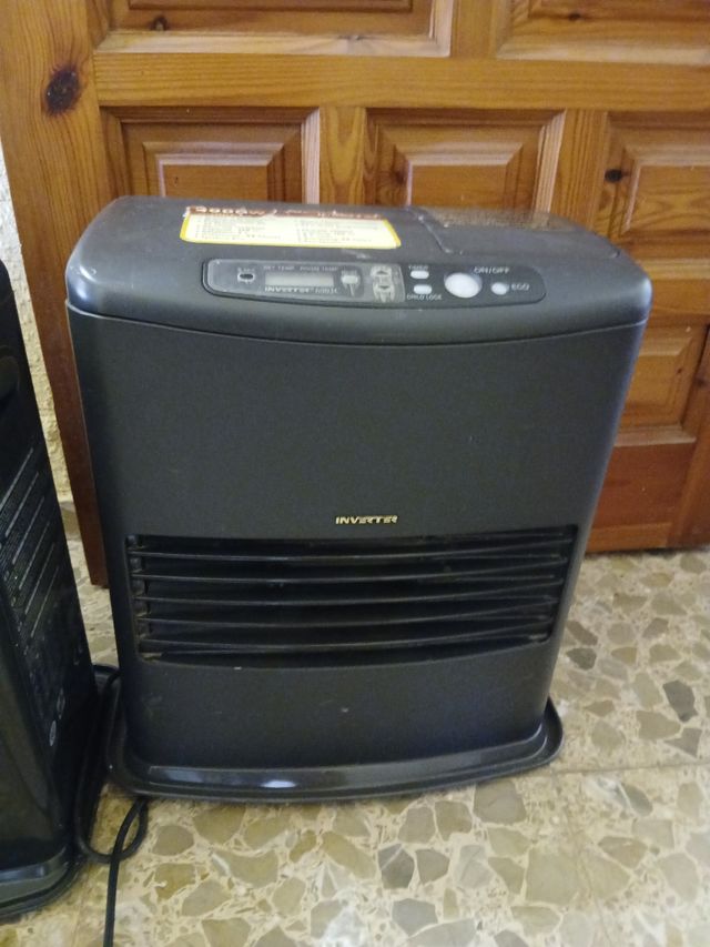 2 estufas de parafina negros. 2 tamaños