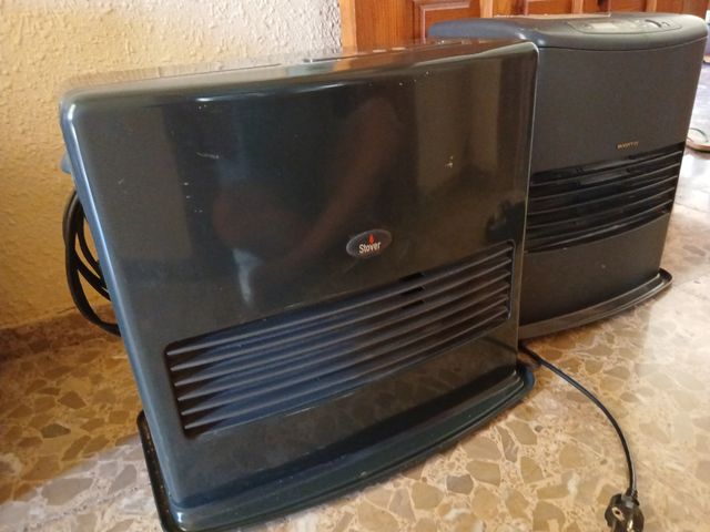 2 estufas de parafina negros. 2 tamaños