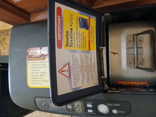 2 estufas de parafina negros. 2 tamaños