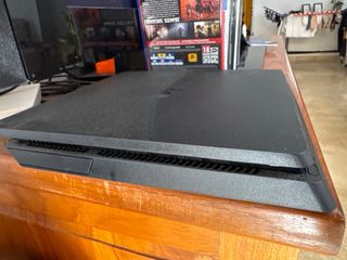 PS4 Slim Negra + 2 Mandos + 10 Juegos