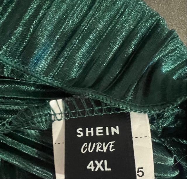 Top plissettato verde bottiglia con bretelle