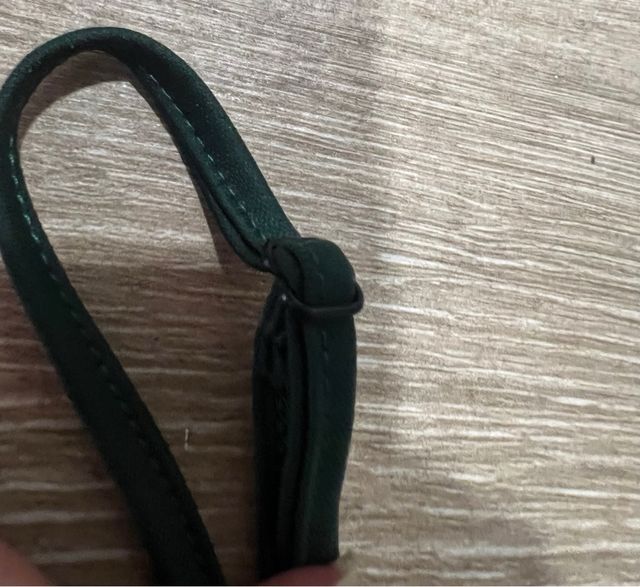 Top plissettato verde bottiglia con bretelle