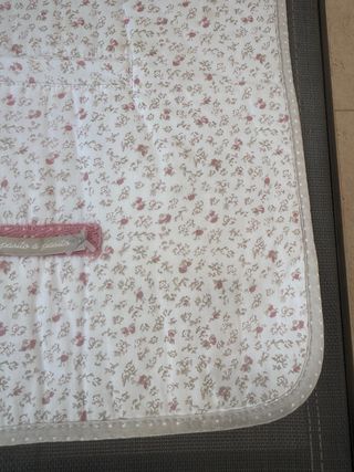 Bolsa y colchoneta a juego para silla de bebé