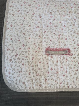 Bolsa y colchoneta a juego para silla de bebé