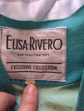 Traje de chaqueta y falda color turquesa