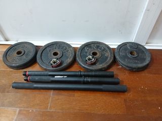 Barra y discos de entrenamiento