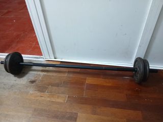 Barra y discos de entrenamiento