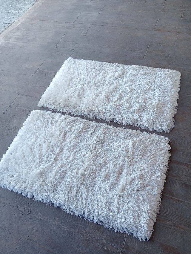 Alfombras blancas de tela