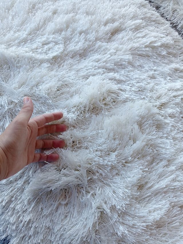 Alfombras blancas de tela