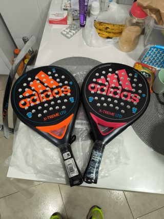 2 palas Adidas x trem rosa y azul efecto rugoso