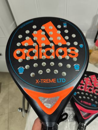 2 palas Adidas x trem rosa y azul efecto rugoso