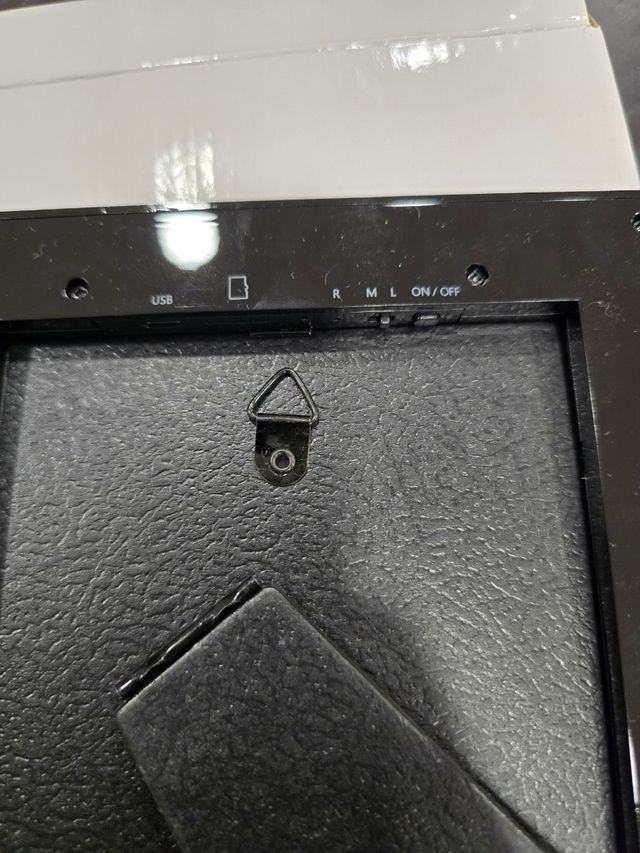 Cornice per foto con telecamera.