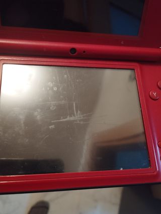 Nintendo DS XL para piezas. Pantalla arañada.