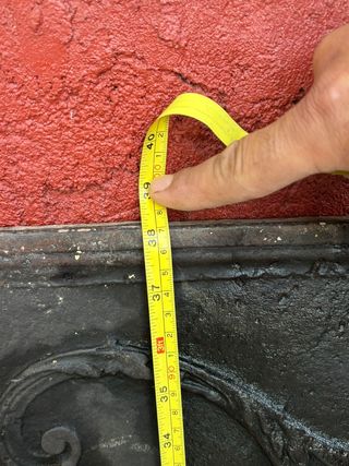 Placa de chimenea antigua de hierro fundido