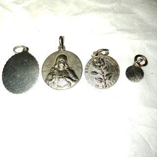 Colección medallas de plata y crucifijo de bronce