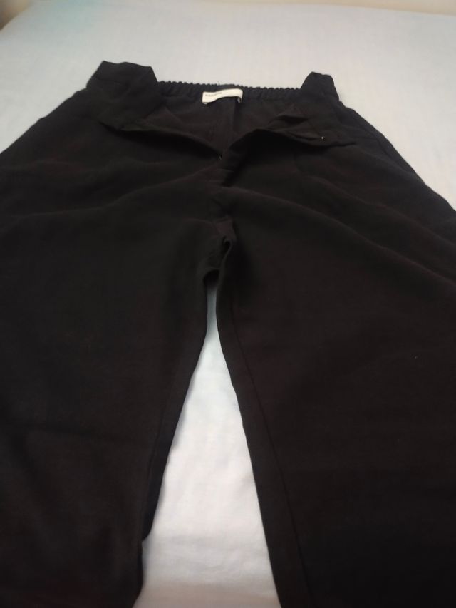 2 Pantalones chica Talla M negro y S verde