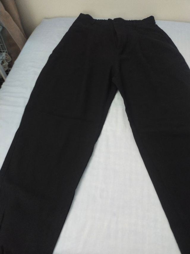 2 Pantalones chica Talla M negro y S verde
