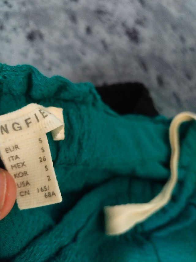 2 Pantalones chica Talla M negro y S verde