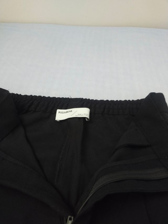 2 Pantalones chica Talla M negro y S verde