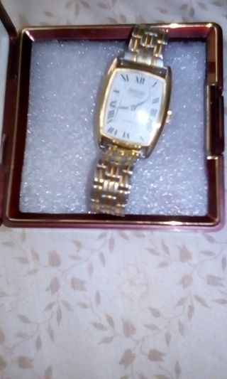 Reloj vintage cuerda mujer oro y plata