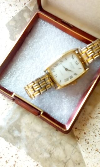 Reloj vintage cuerda mujer oro y plata