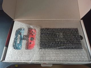 Nintendo Switch 1 Azul y Rojo + Funda