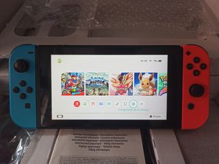 Nintendo Switch 1 Azul y Rojo + Funda