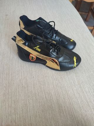 Zapatillas Puma Ferrari Negras y Doradas
