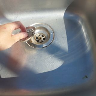 Fregadero Teka acero inox con grifo extraible.