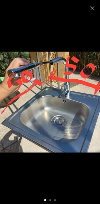 Fregadero Teka acero inox con grifo extraible.