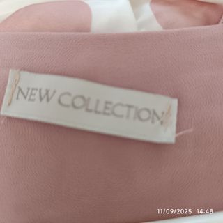 Camisa sin mangas con bordado floral